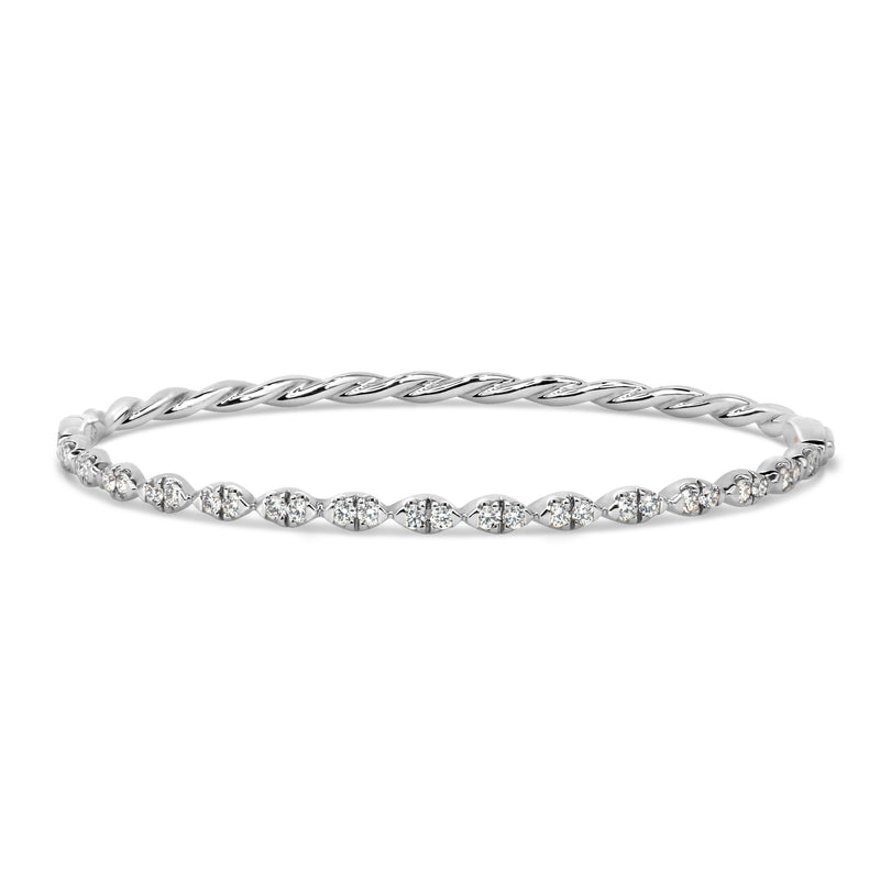18K white gold twist-shaped bangle with ethically-sourced round brilliant diamonds
