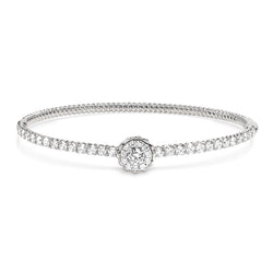 18K White Gold Bangle with a Blooming Flower Design Centrepiece. Bangle includes round brilliant diamonds