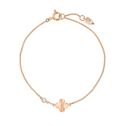 Dainty bracelet handcrafted in 18K rose gold with ethically-sourced round brilliant diamonds. Thin Chain with a Begonia Flower Shaped Detail.