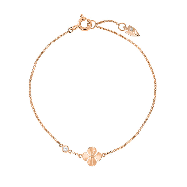 Dainty bracelet handcrafted in 18K rose gold with ethically-sourced round brilliant diamonds. Thin Chain with a Begonia Flower Shaped Detail.