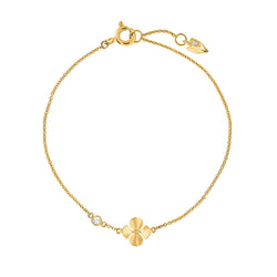 Dainty bracelet handcrafted in 18K yellow gold with ethically-sourced round brilliant diamonds. Thin Chain with a Begonia Flower Shaped Detail.