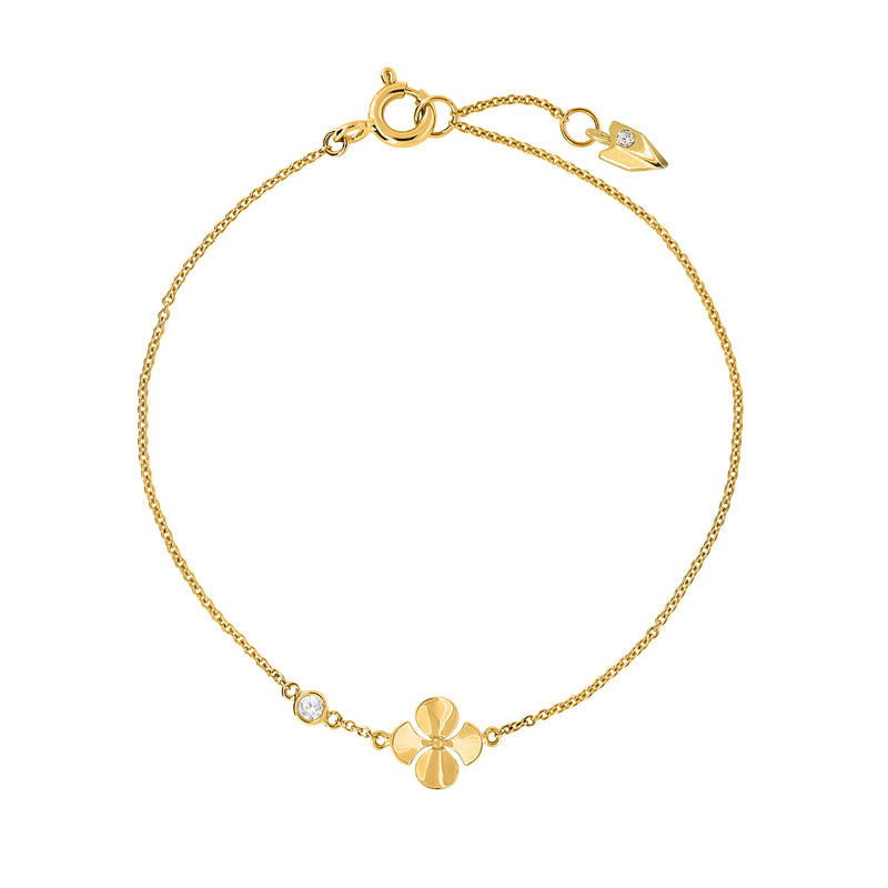 Dainty bracelet handcrafted in 18K yellow gold with ethically-sourced round brilliant diamonds. Thin Chain with a Begonia Flower Shaped Detail.