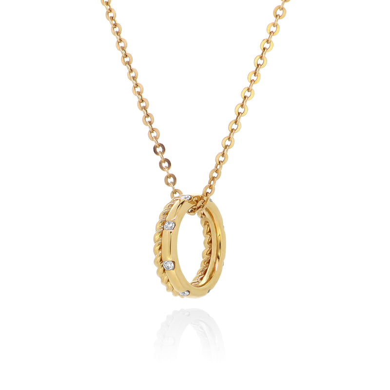 18K yellow gold chain necklace with a double ring pendant. One ring features our signature twist pattern in yellow gold, and the other is yellow gold with ethically-sourced round brilliant diamonds
