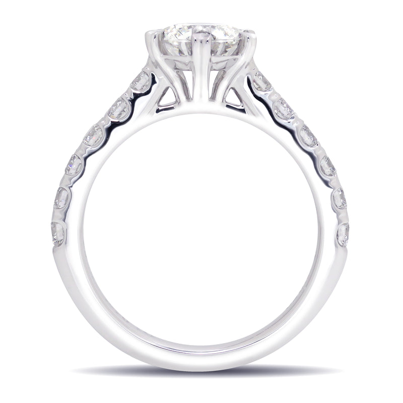 Diamond Engagement Ring. Centre Diamond Stone is 1 Carat, and includes 12 0.5 Carat Diamond Stones on the Band. Heart-shaped Prongs