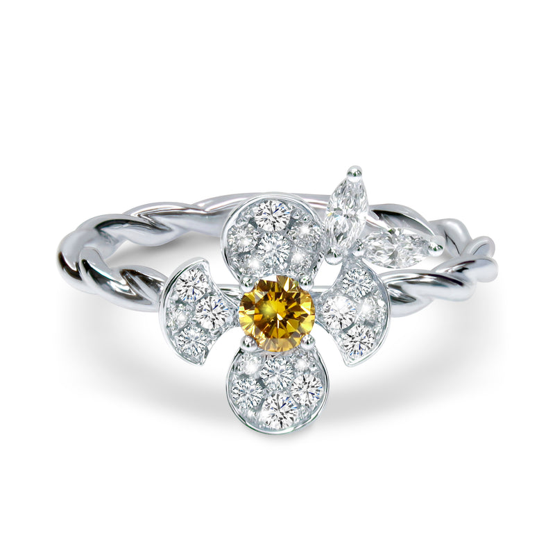 Platinum ring with ethically-sourced round brilliant, marquise and yellow diamonds. Flower shape ring 